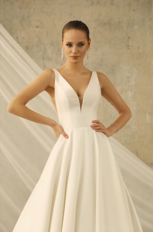 Suknie ślubne Olśniewająco minimalistyczna suknia ślubna