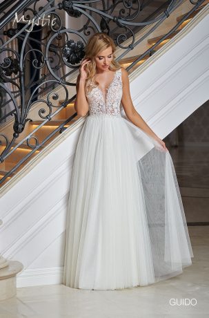 Suknie ślubne Wyjątkowa suknia ślubna z pięknym wcięciem na plecach w kształcie trapezu i koronkowym topem