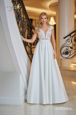Suknie ślubne Delikatna suknia w stylu boho z koronkową górą